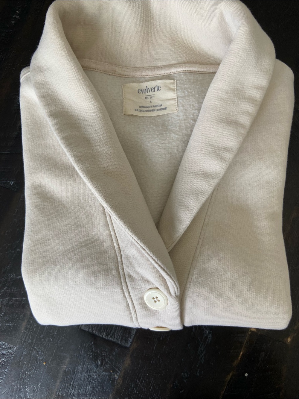 Women’s Pullover Sweatshirt in Ivory. Two buttons and pop up collar.